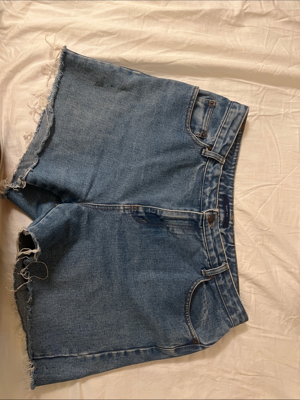 bill blass Women's Distressed Denim Shorts in Blue